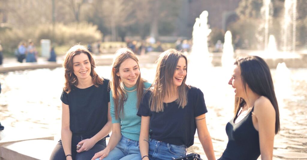 Group of friends laughing together while answering ice breaker questions