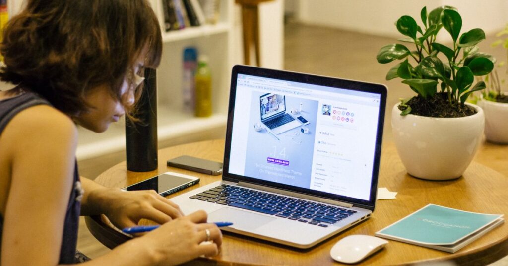 Introvert working quietly at a laptop, one of many jobs for introverts